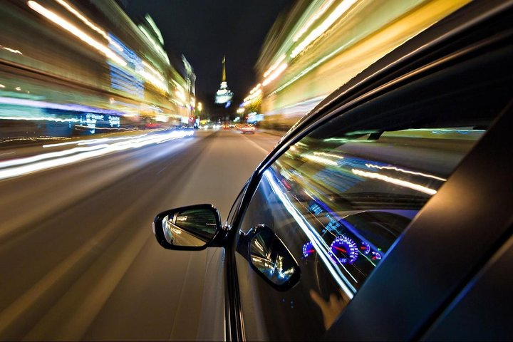 Experience the excitement of Dubai's streets as you glide smoothly between Emirates in a premium vehicle enjoying the city lights in the comfort of a private transfer.